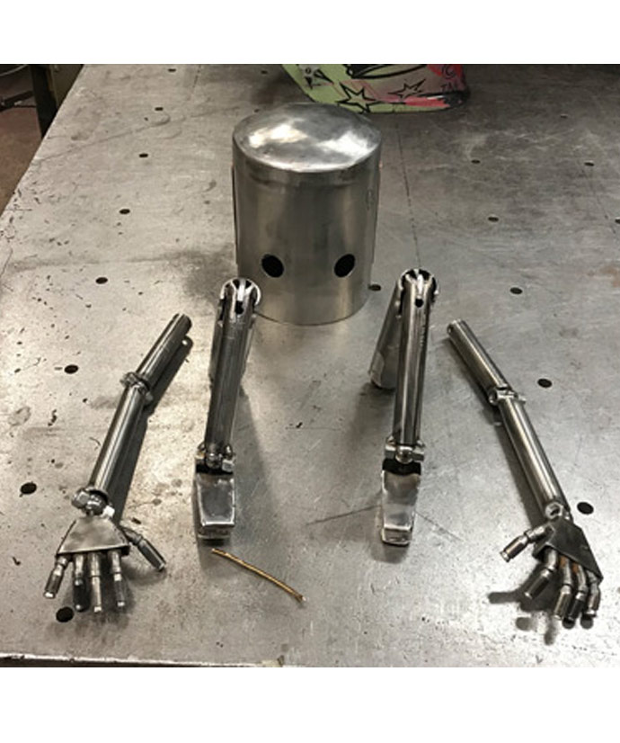 robot metal pieces from a metal sculpture NYC artist de nadie